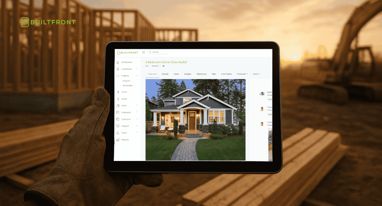 Contractor Holding a Tablet Using a CRM Software